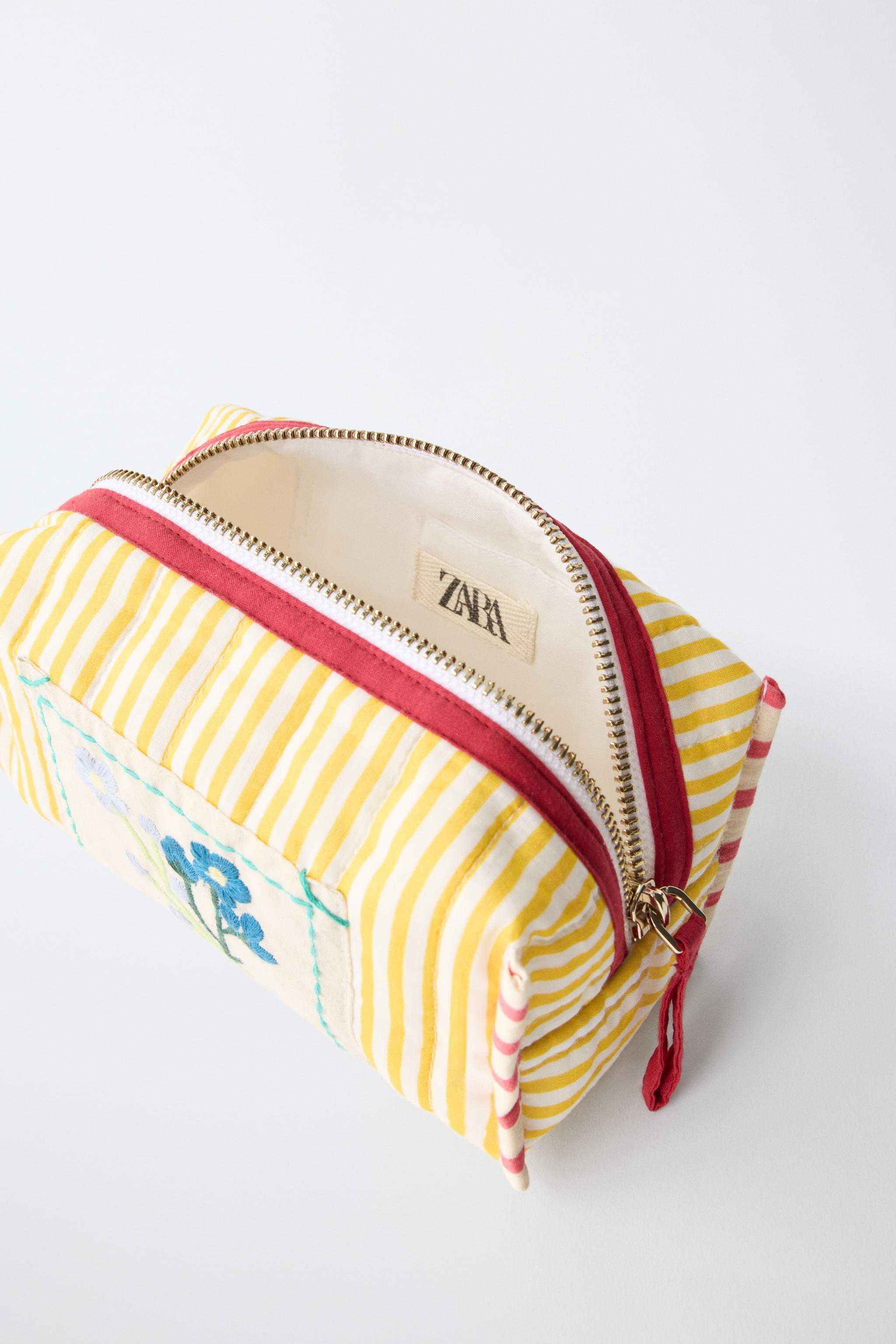 EMBROIDERED STRIPED COSMETICS BAG